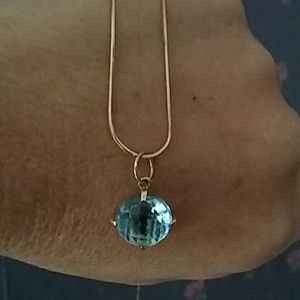 14 kt gold Blue Topaz pendant